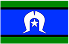 The Torres Strait Islander Flag, has two green horizontal stripes at the top and bottom, separated by a blue stripe in the middle. Thin black stripes divide the green and blue sections. A white Dhari is centred, with a white five-pointed star beneath it. Green represents the land, blue the sea, and black the people.