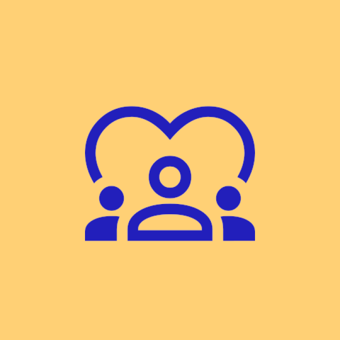 An icon of three individuals, in front of a large heart.