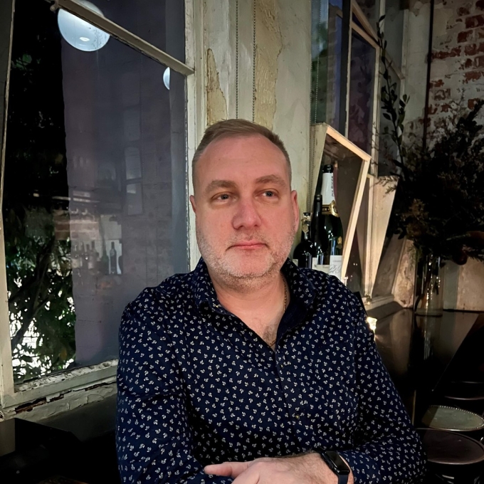 man sitting at table