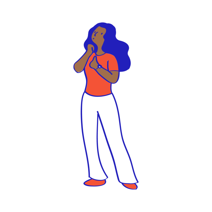 A woman reflecting, with one hand resting on her chin.